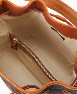 Dooney & Bourke Ready For the Getaway | Pebbled Leather^All Weather Leather 3.0 Drawstring 25